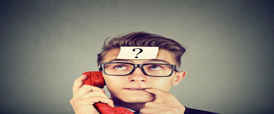 Question Mark on mans head on telephone