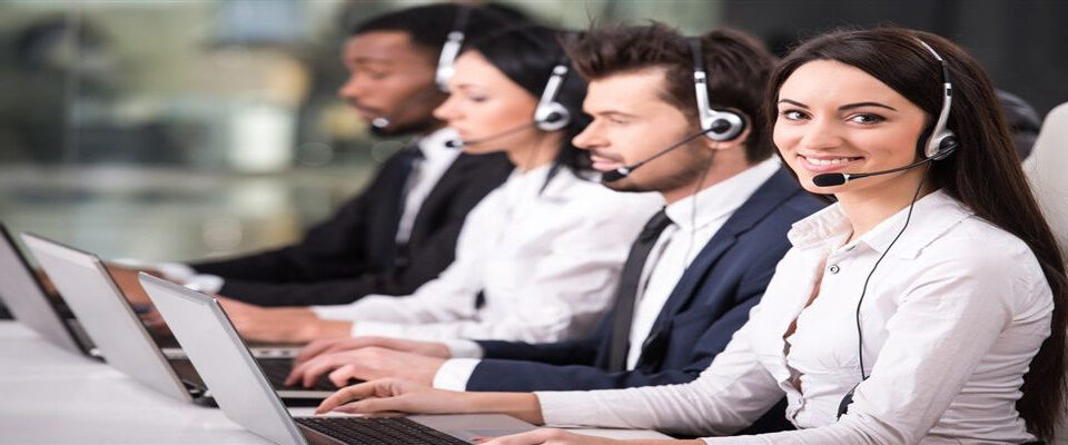 Contact Us - Smiling woman call centre headset