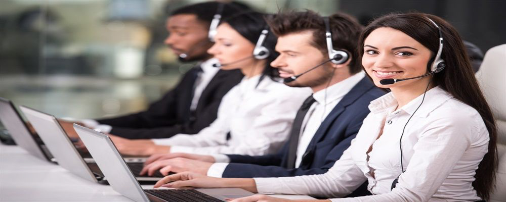 Contact Us - Smiling woman call centre headset